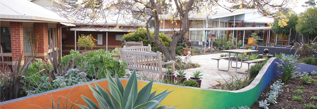 View of the Brain Disorders Unit through the sensory garden